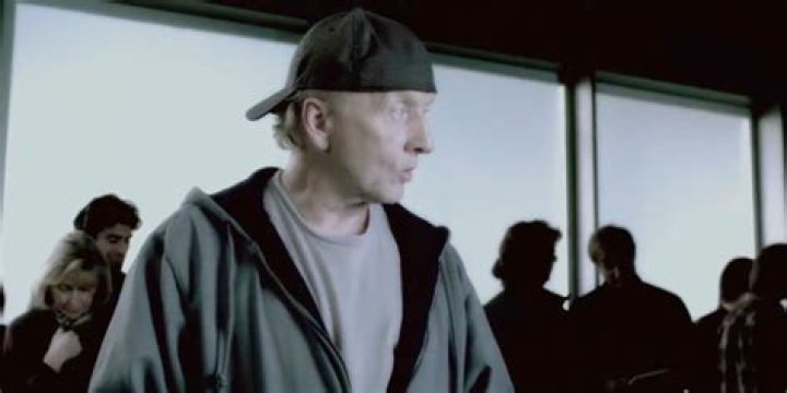 John Kramer watching Saw backwards Meme